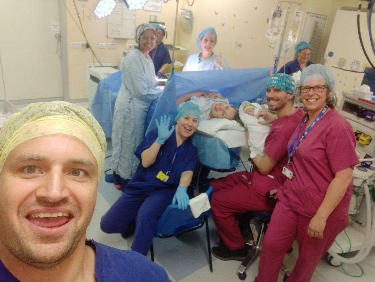 Lizzy Yarnold in the operating theatre with her newborn and husband James Roche Picture: Lizzy Yarnold's Twitter