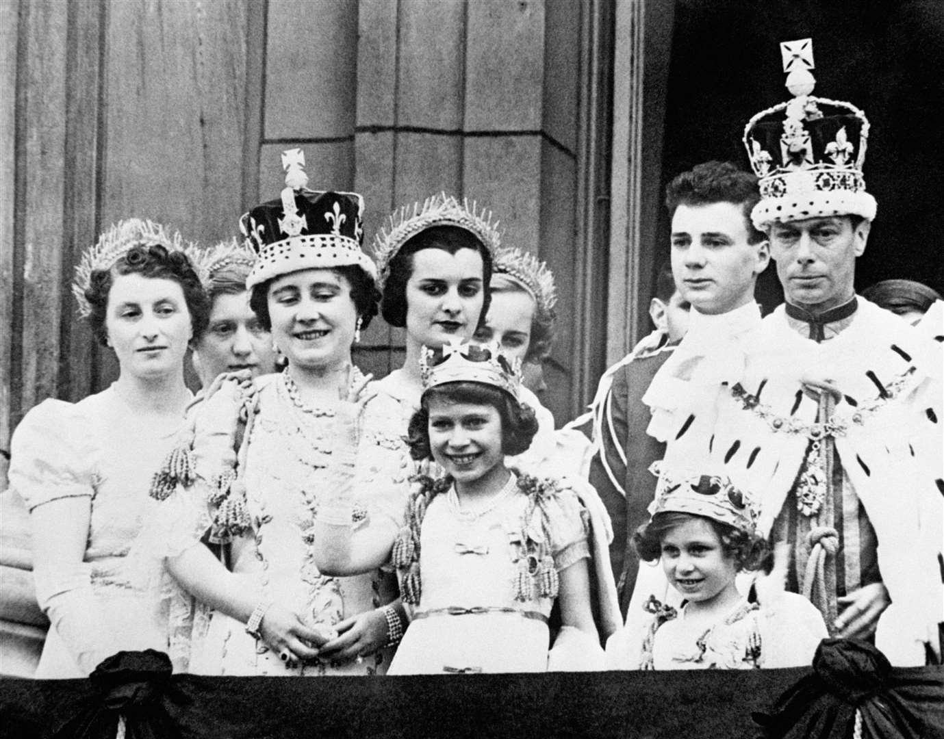 Queen Elizabeth (later the Queen Mother) and King George VI after his coronation, on the balcony of Buckingham Palace. Picture: PA.