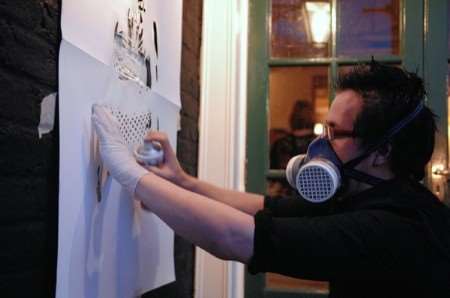 Oliver Winconek creating a new wall mural at The Dolphin pub in Canterbury. Picture: Terry Scott