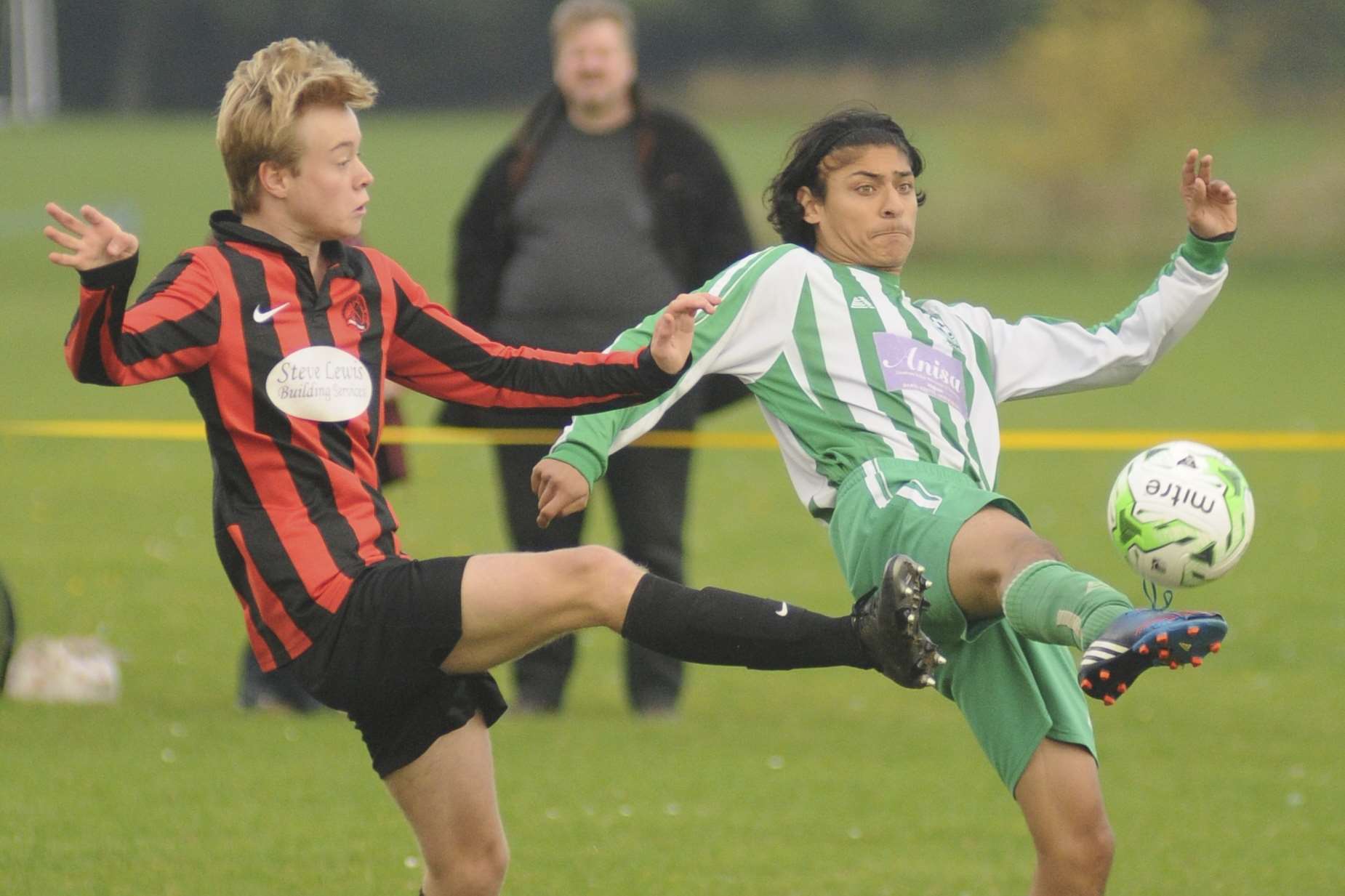 Meopham Colts under-16s (red and black) and Eagles on the stretch in Division 1 Picture: Steve Crispe
