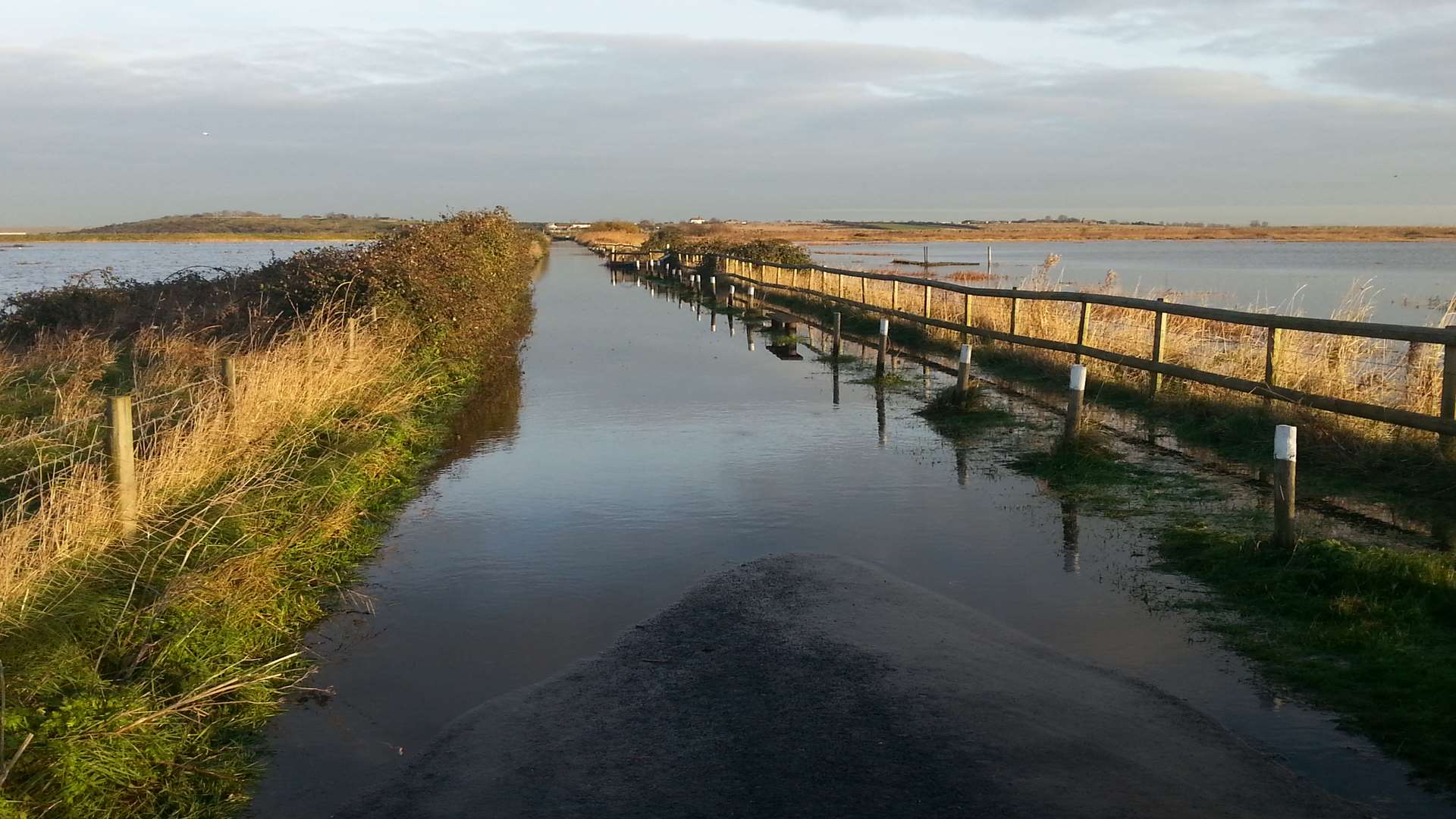 Harty Ferry Road in Faversham under water. Picture: Bess Browning