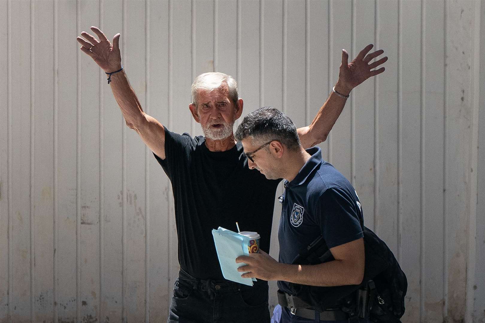 David Hunter is transported from Paphos District Court (Victoria Jones/PA)