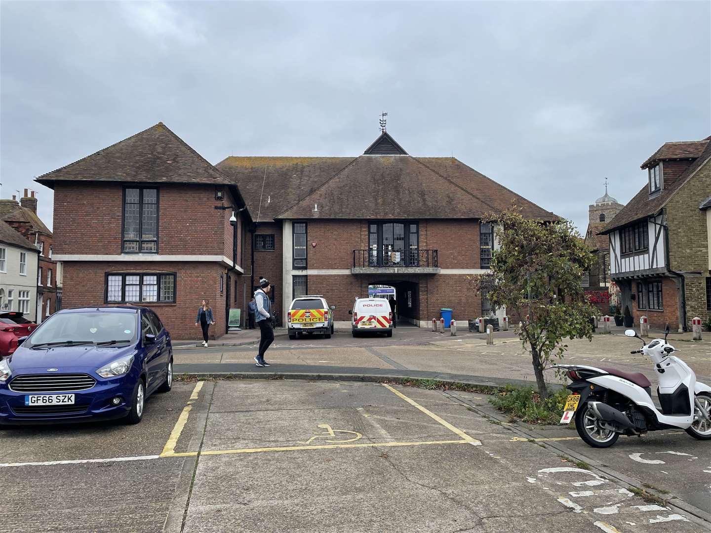 Police outside Sandwich Guildhall after the attack on a member of staff