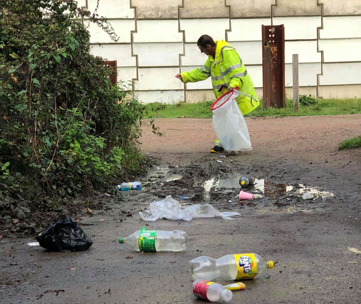 The Folkestone Town Sprucer team clearing the subway under the M20. The team describe it as a drinking den with litter and broken glass. Picture: Peter Phillips