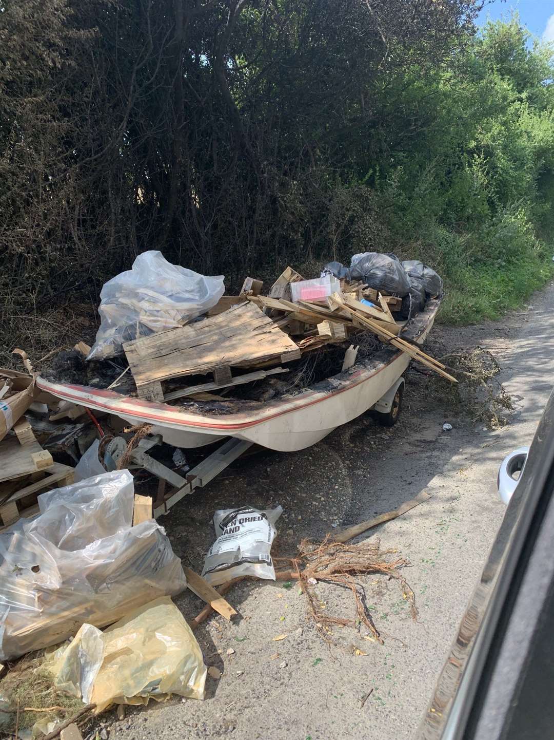 A boat full of rubbish was dumped in Shawstead Road, Chatham. Image: Glenda Crumpton