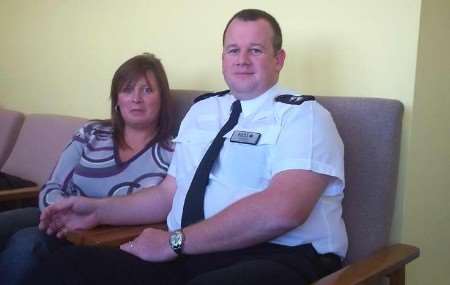 AWARD FOR VALOUR: Insp Kenneth Elmes with his wife Jane