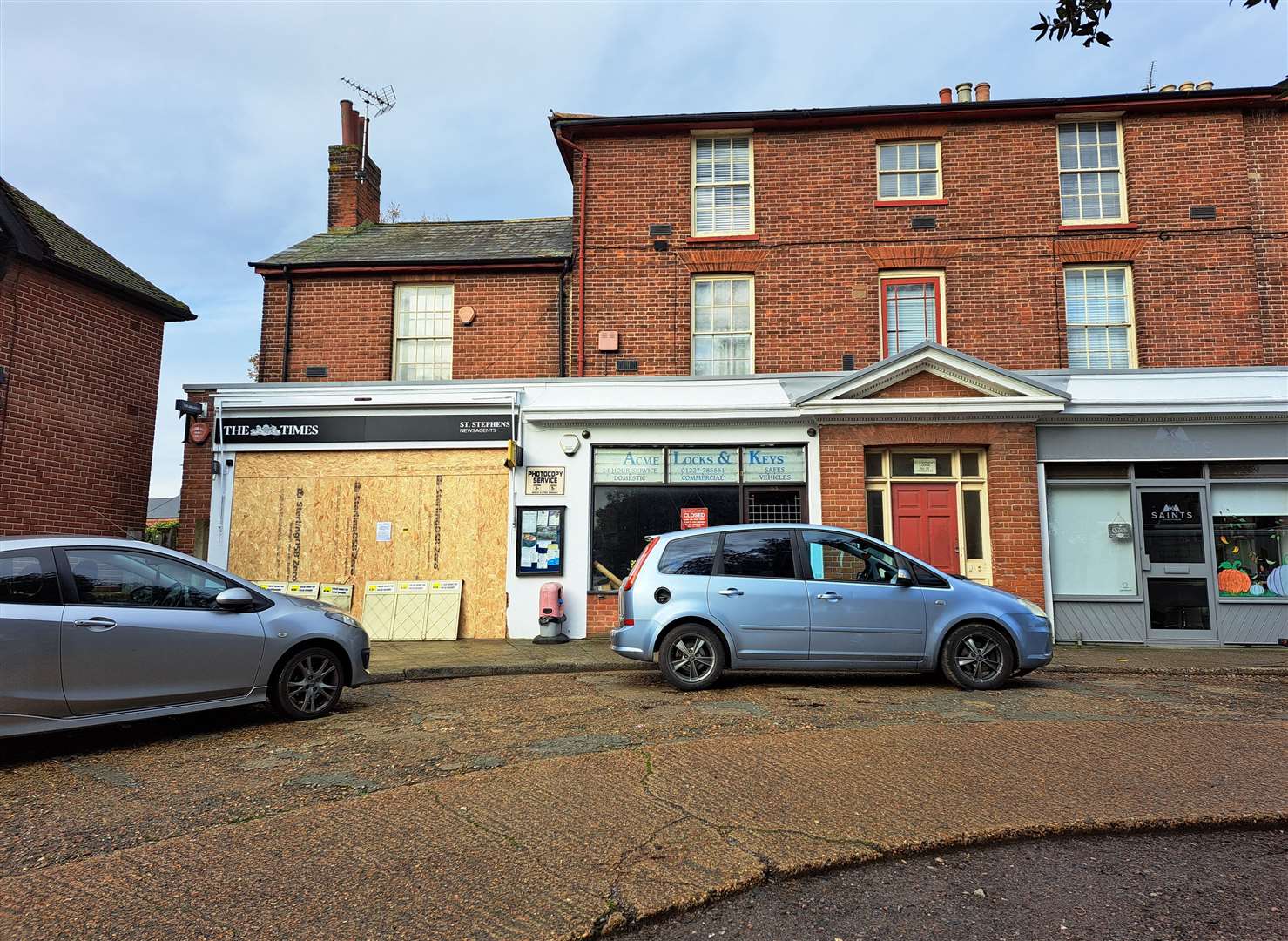 The shop was boarded up and closed while repairs were made following the raid in October