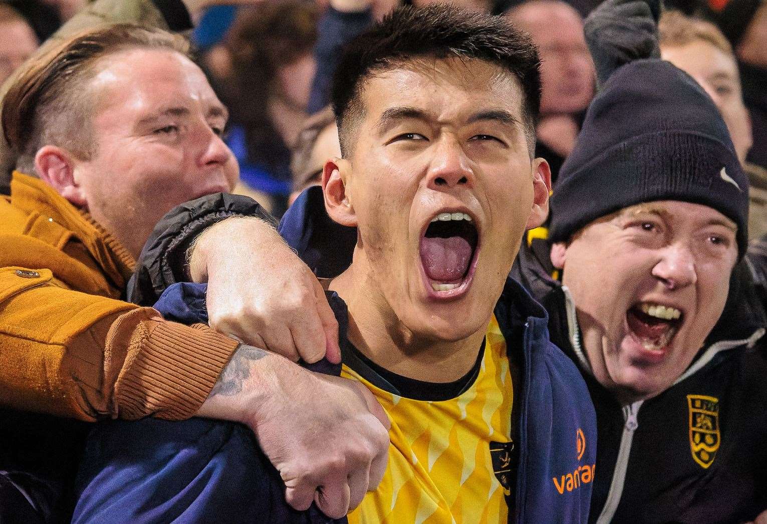 Maidstone FA Cup hero Bivesh Gurung celebrates with fans after the game. Picture: Helen Cooper