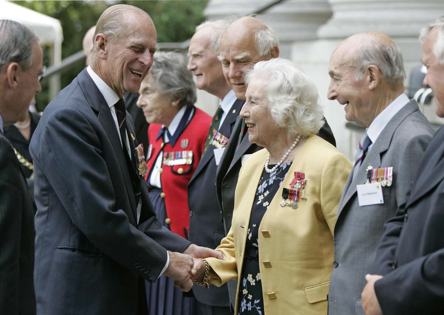 The Duke of Edinburgh shakes the hand of Dame Vera at a service in 2005 (PA)