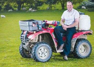 Edward Lovejoy on a quad bike similar to the one stolen from his farm