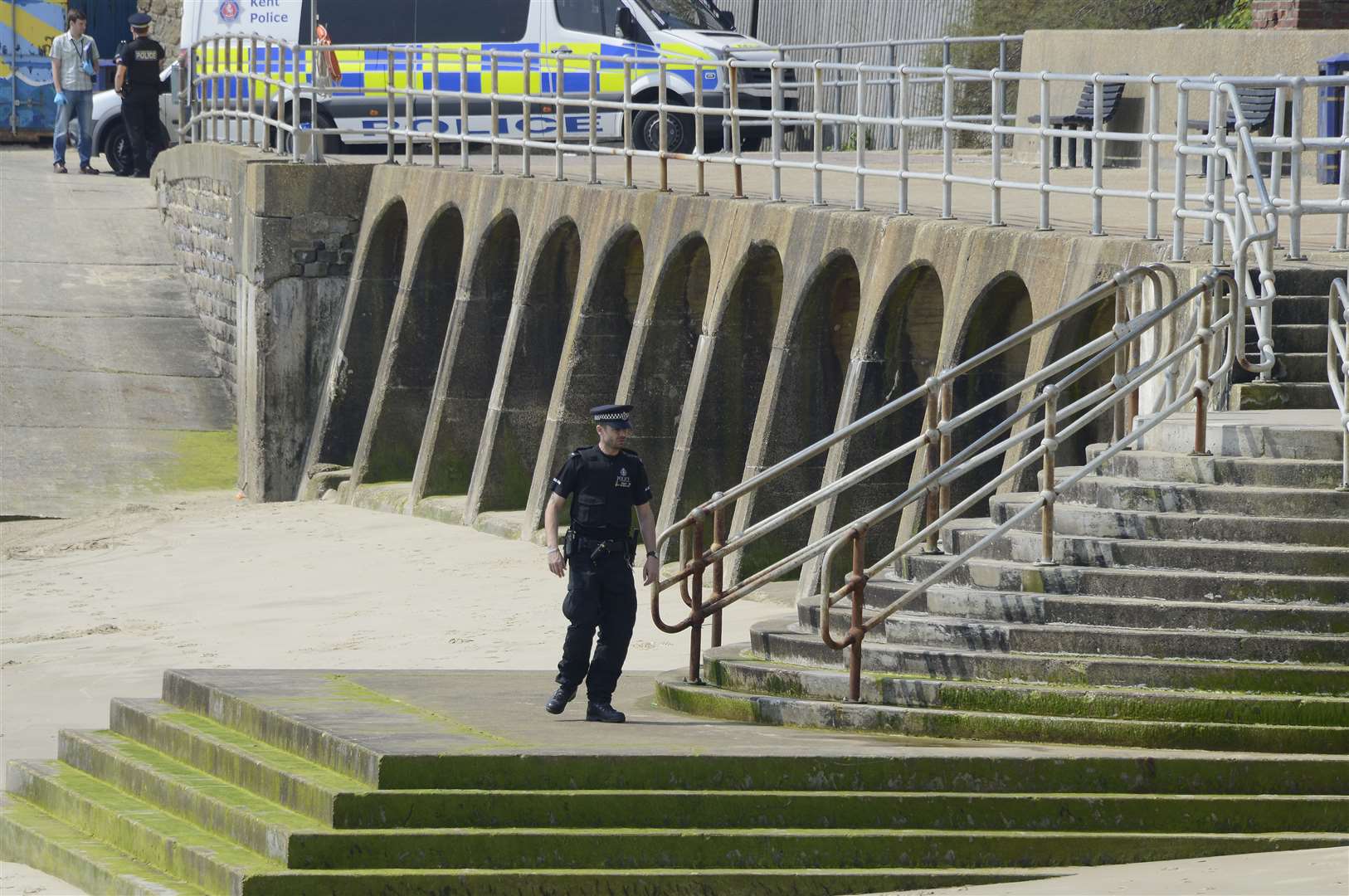Police officers conducted their inquiries before the tide came in