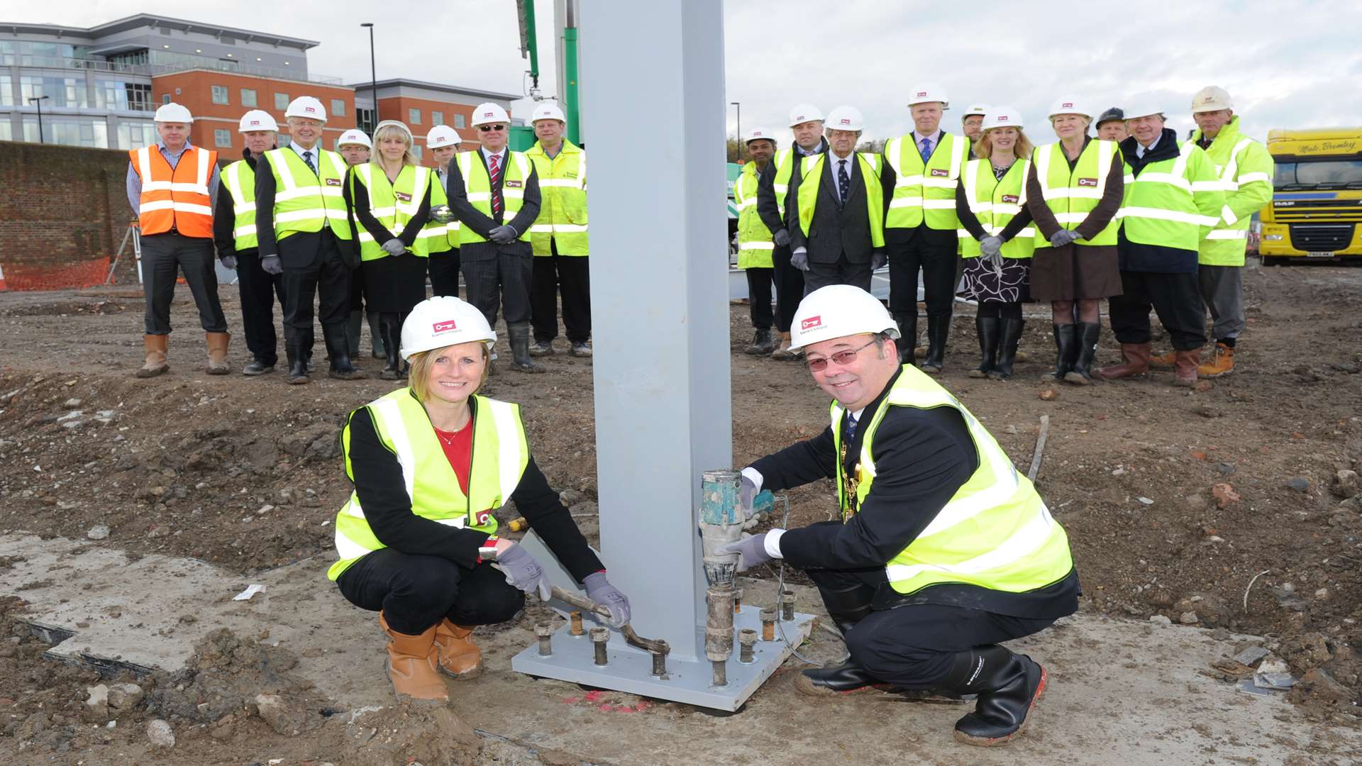 The building site of Medway's new University Technical College, Principal Dr Karon Buck and Mayor of Medway Cllr Barry Kemp, 'helping' with the building work.