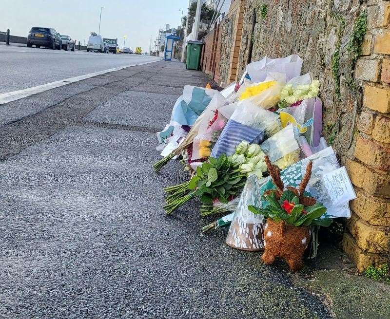 Floral tributes have been left outside William Brown's home in Sandgate Esplanade