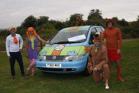 Best friends Chris Turner, Craig Lapine, Tom Osenton and Ryan Orton converted a car into Scooby Doo’s Mystery Machine for a surprise stag do and banger rally