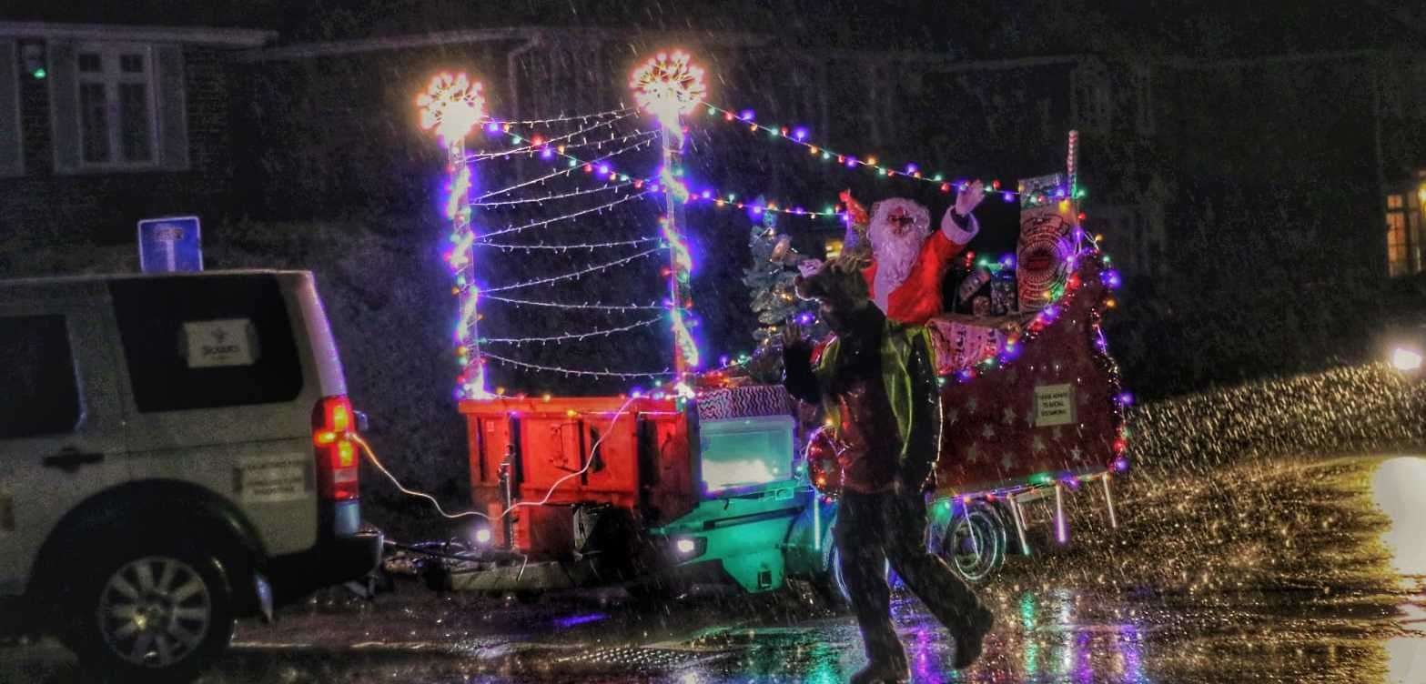 Father Christmas waved from his custom made sleigh. Picture: Coxheath Scouts Group