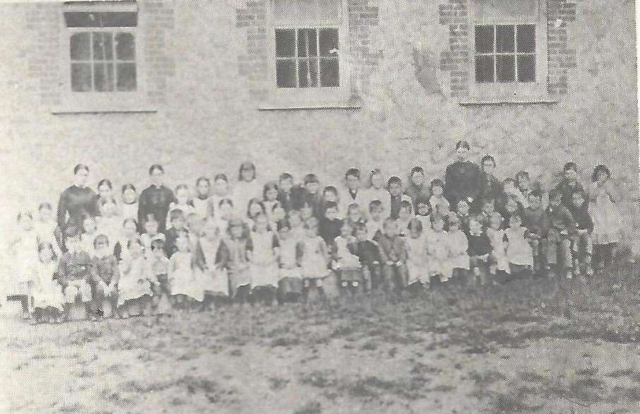 The staff and children of Chart Sutton National School in 1882