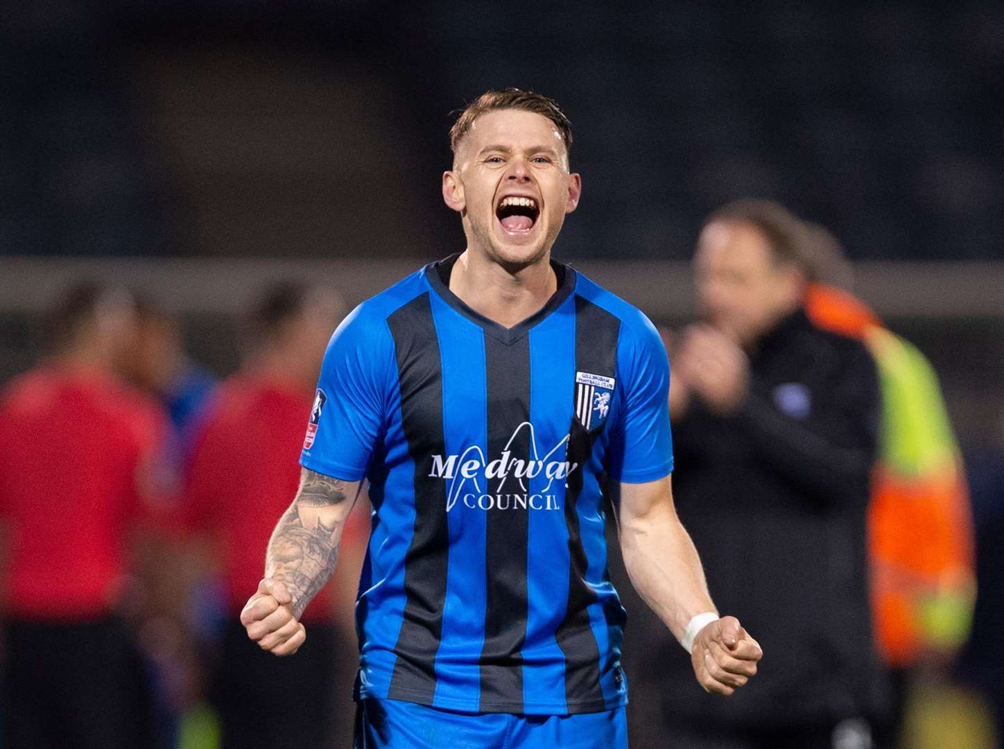 Gillingham midfielder Mark Byrne celebrates the win over Cardiff City in round three Picture: Ady Kerry