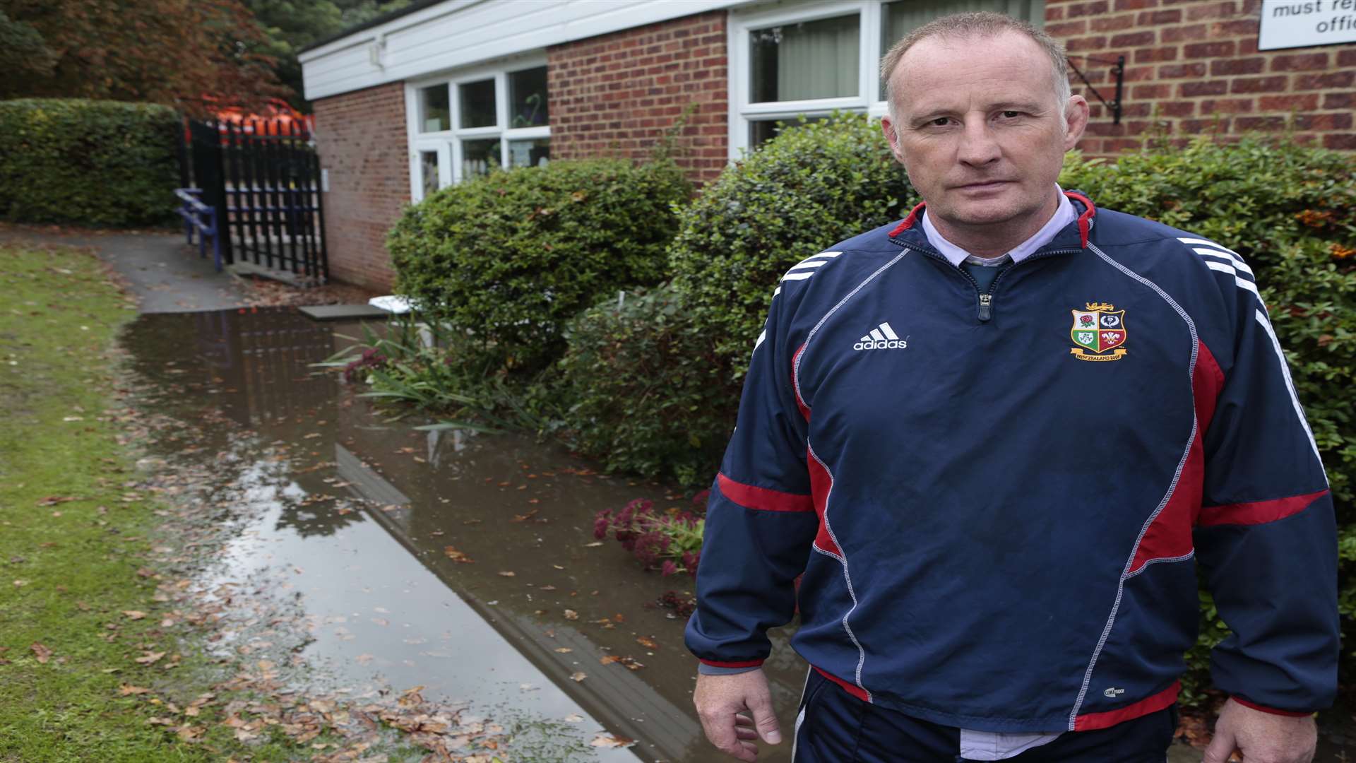 More Park head teacher Danny Coleman, pictured during the clean up operation following October's flooding, is against the development