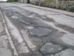Potholes in Haste Hill Road, Boughton Monchelsea. Picture: Leon Date