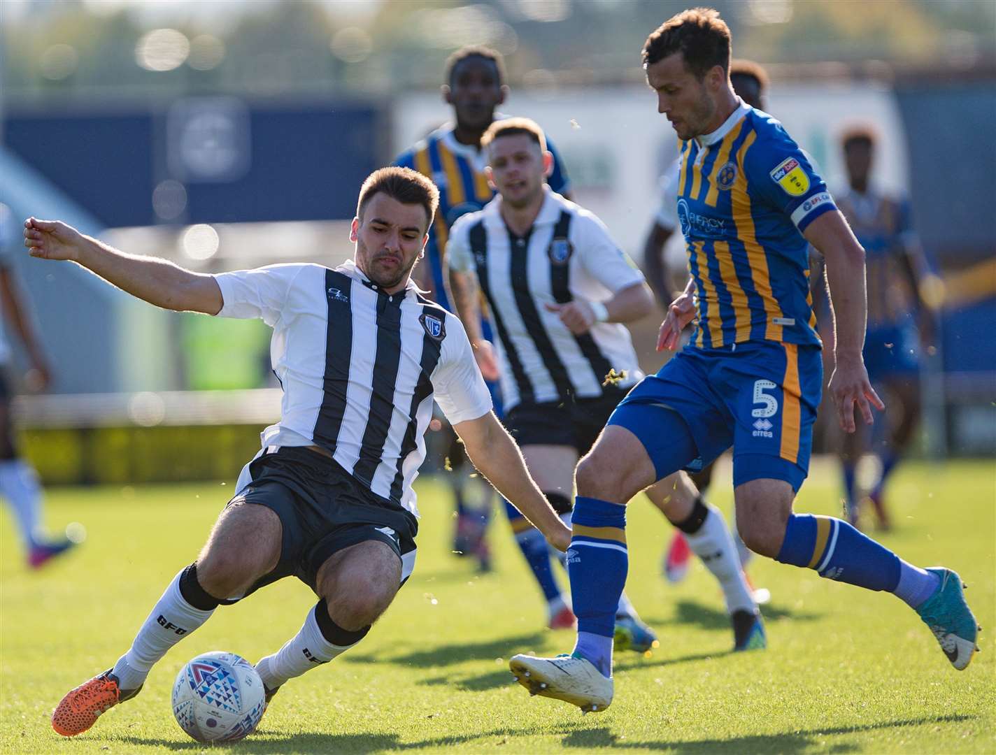 Josh Rees gets to the ball ahead of Mat Sadler Picture: Ady Kerry
