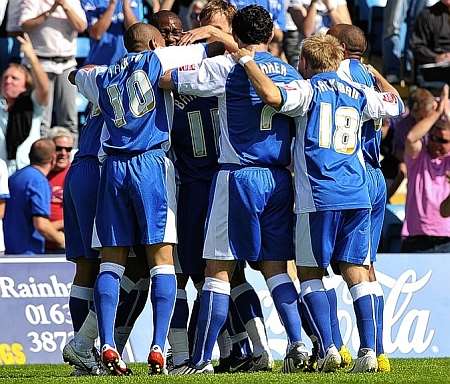 Gillingham celebrate Andy Barcham's opener. Picture: Barry Goodwin