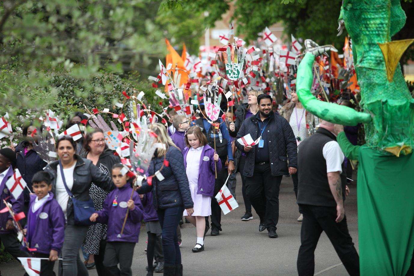 Schoolchildren marching along in last year's St George's Day parade