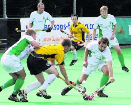 Canterbury (white and green) went top of Men's Conference East after beating Old Loughtonians 3-2