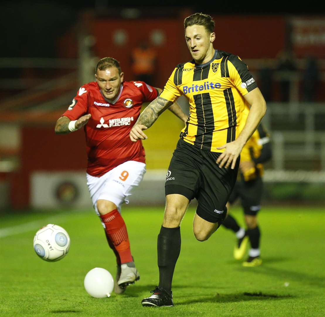 Rob Swaine leaves Danny Kedwell with the balloon on his Maidstone debut Picture: Andy Jones