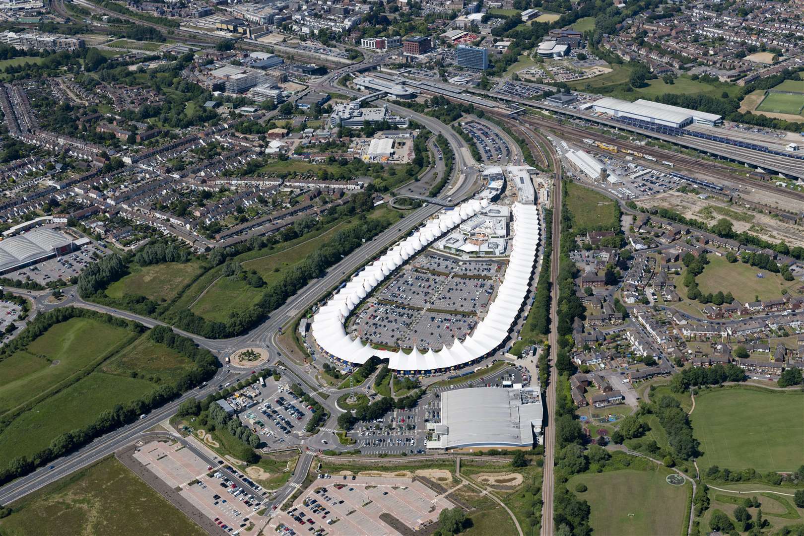 A shot of the Designer Outlet looking towards the town, with the new Outlet car park next to Asda in the foreground. Picture: Ady Kerry/Ashford Borough Council