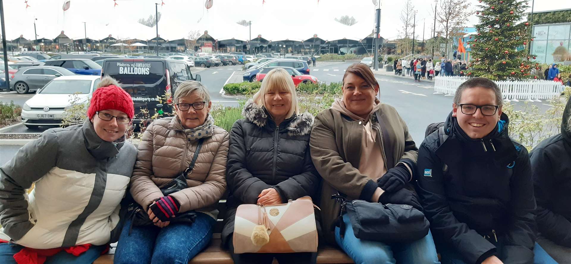Christine White (centre), 68, was the first person in the queue, arriving at 9am