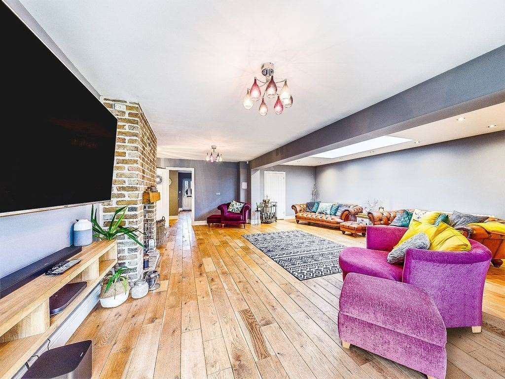 Exposed brick and hardwood floors feature thoughout the house. Photo: Zoopla