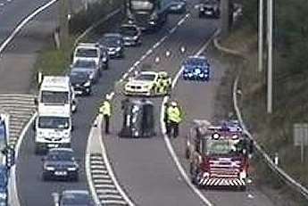 Overturned car on the M2. Picture: Highways Agency