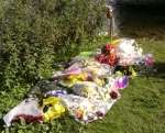 Tribute: Flowers left at the scene