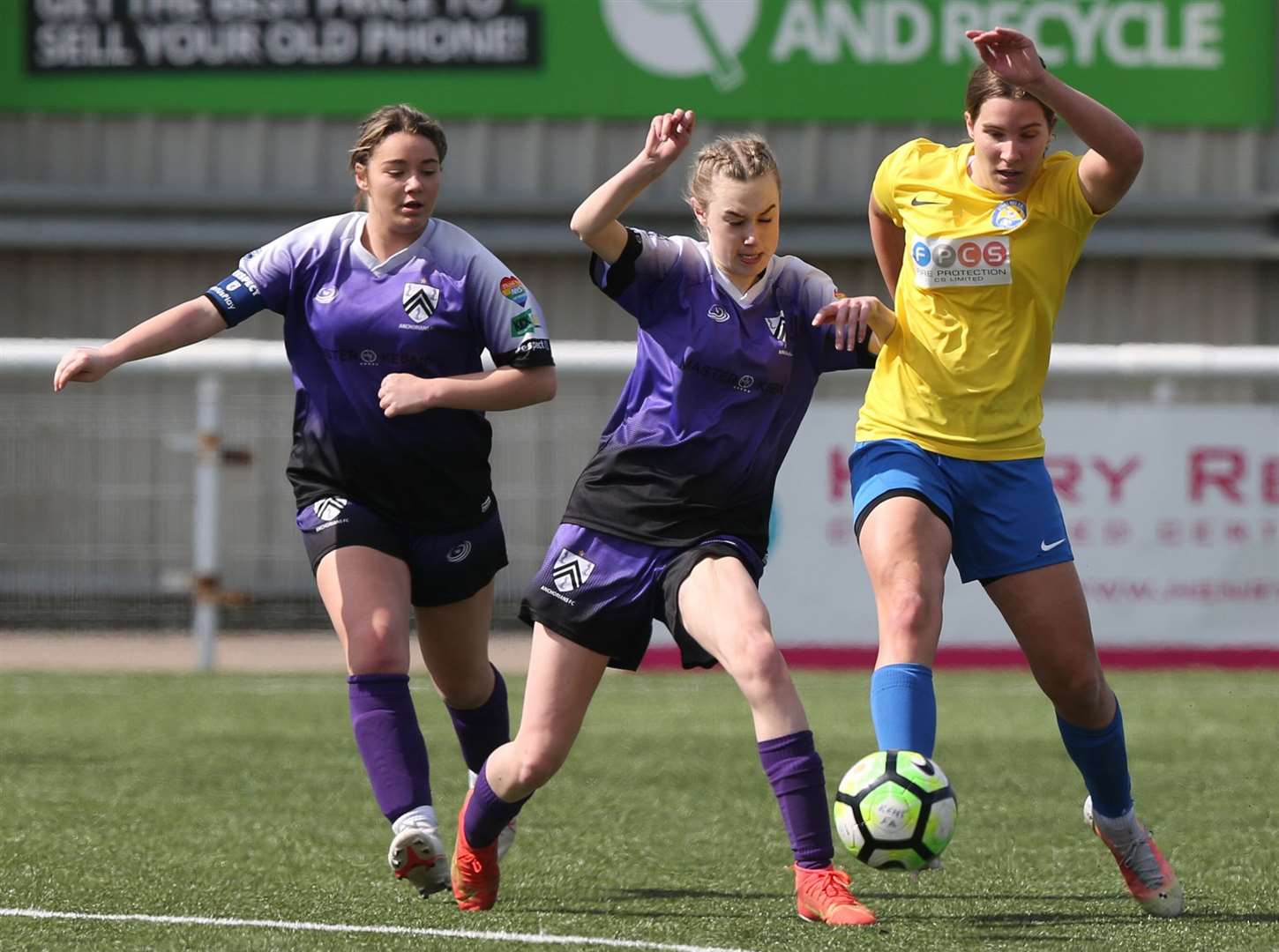 Anchorians and Kings Hill (yellow) battle for possession in the Kent Merit Under-15 girls cup final. Picture: PSP Images