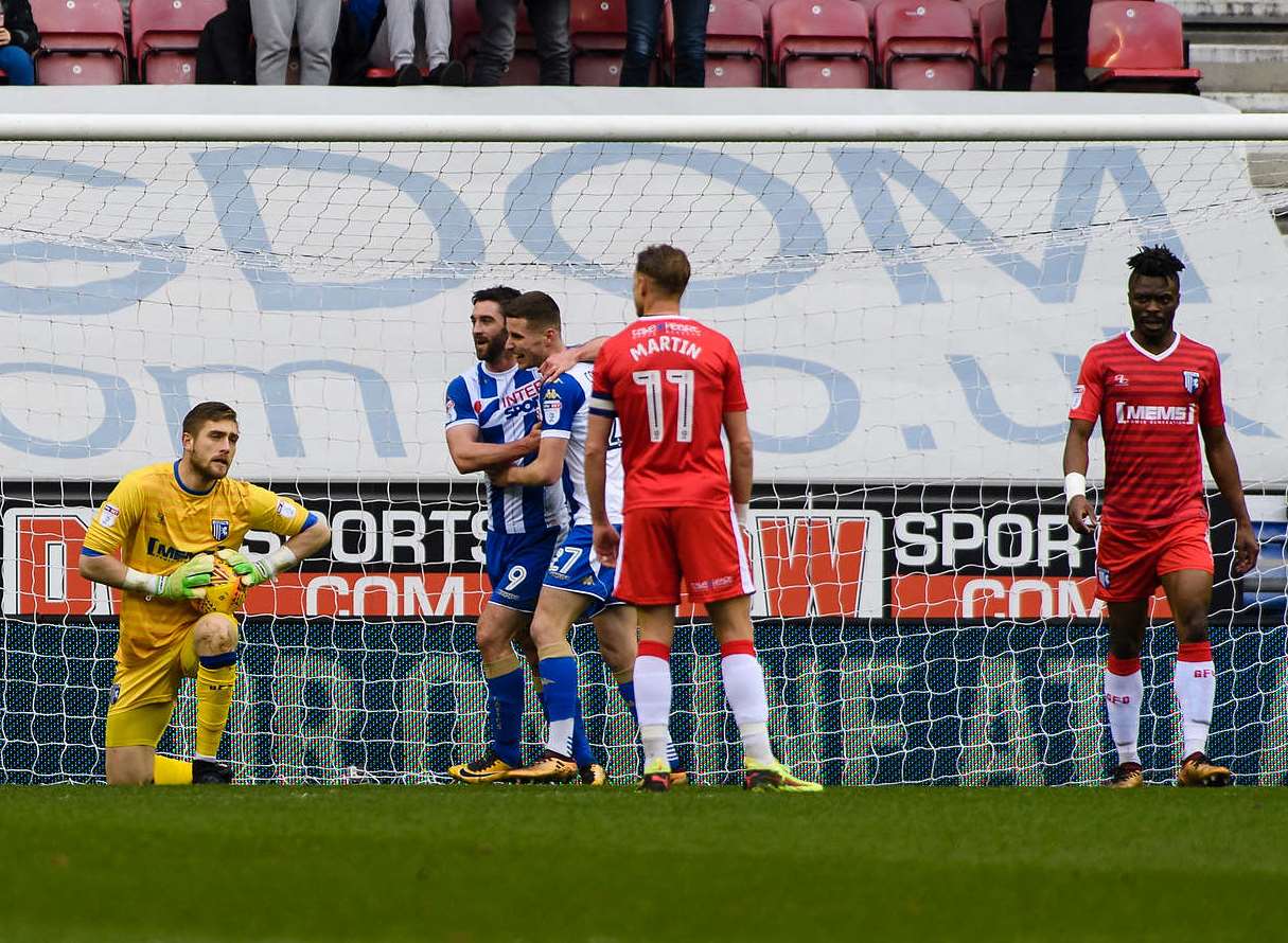 Gillingham concede in the first half at Wigan Picture: Andy Payton
