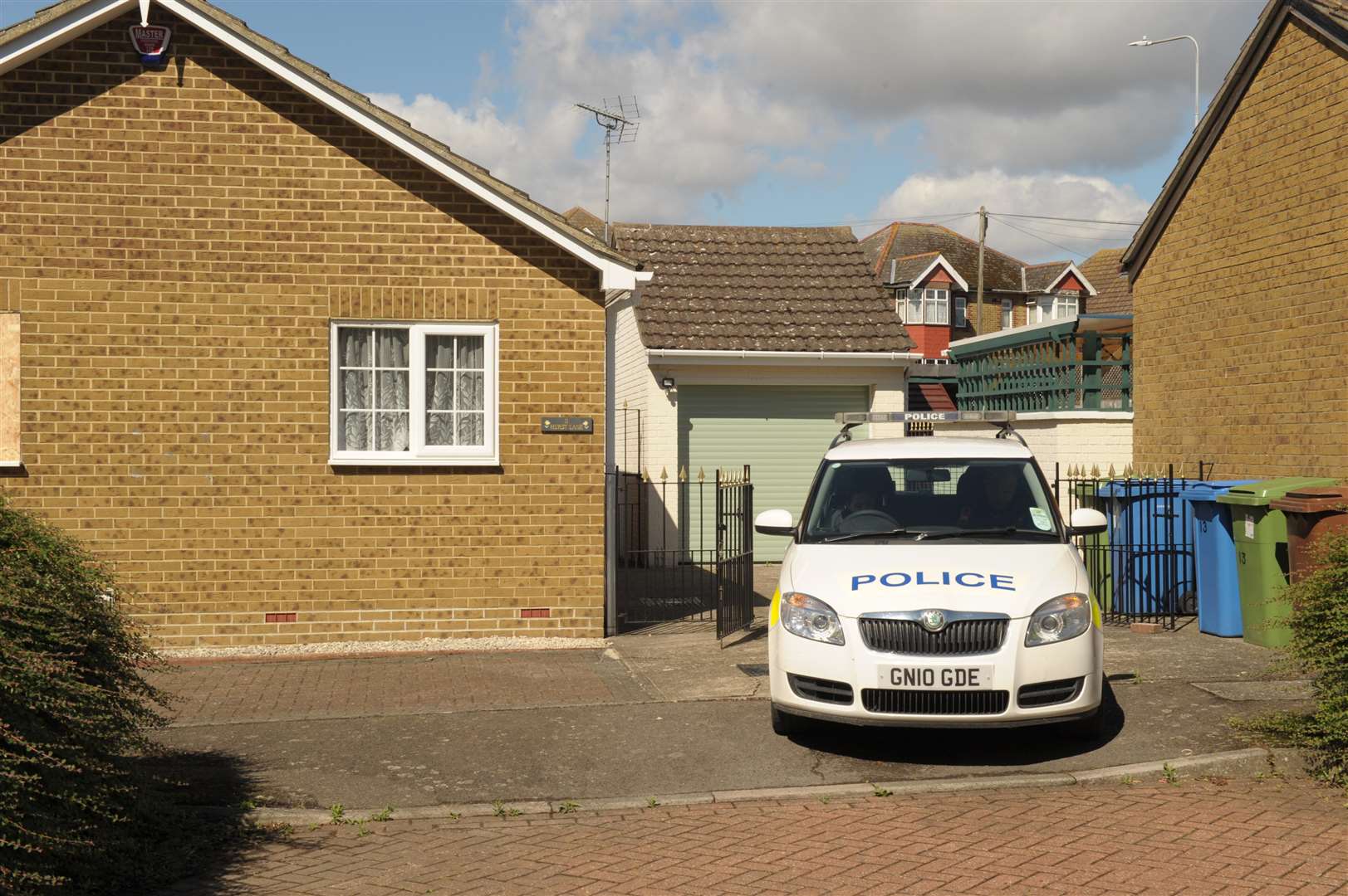 Police outside Mr Packman's home in Kemsley