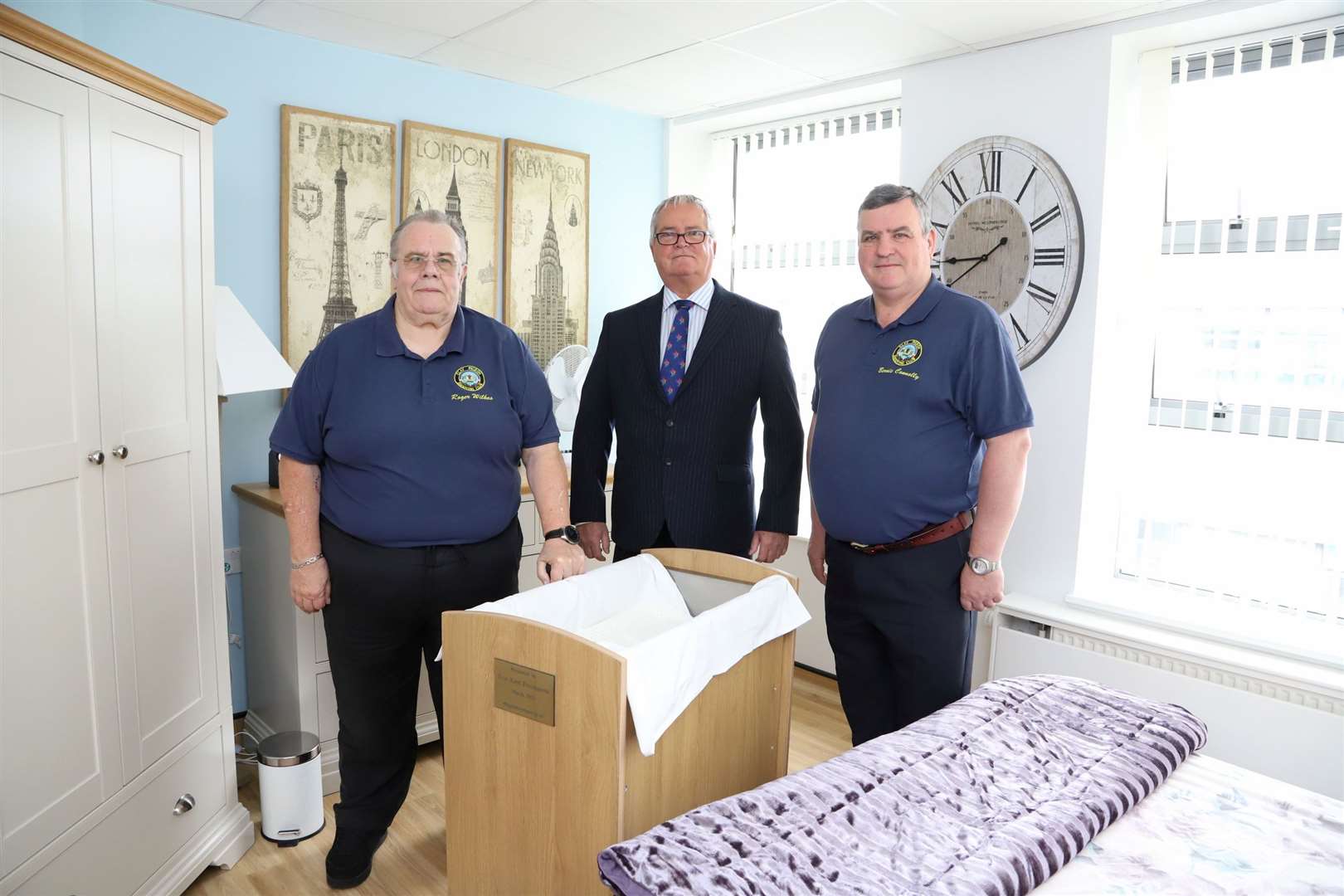 The cot helps to keep the baby at a cool temperature meaning the child can stay with their parents for longer. From left: Roger Wilkes, Richard Wingett, Assistant Provincial Grand Master and Bernie Connolly, Chairman, East Kent Masonic Clay Shooting Team