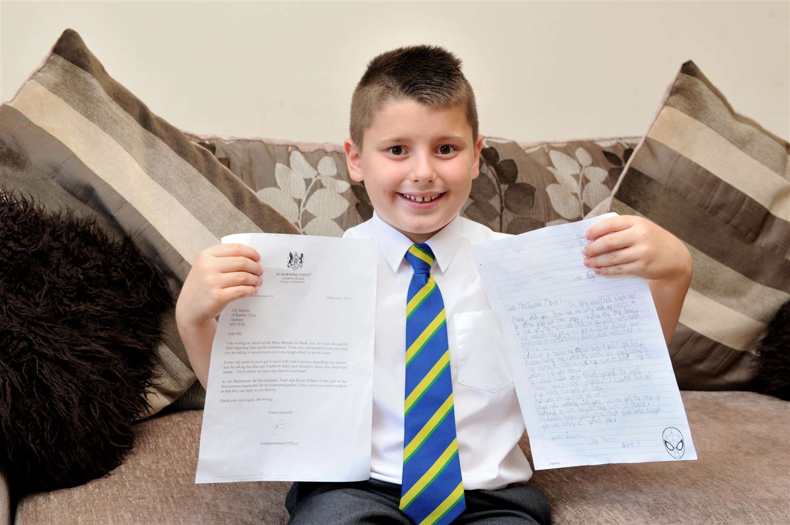 Olly Bunton, with letter he wrote and letter he received back Picture: Simon Hildrew... (4222381)
