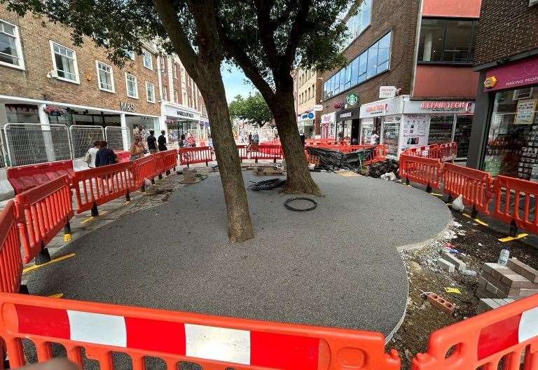 Use of Flexipave eco-material around base of trees in St George’s Street, Canterbury, divides opinion