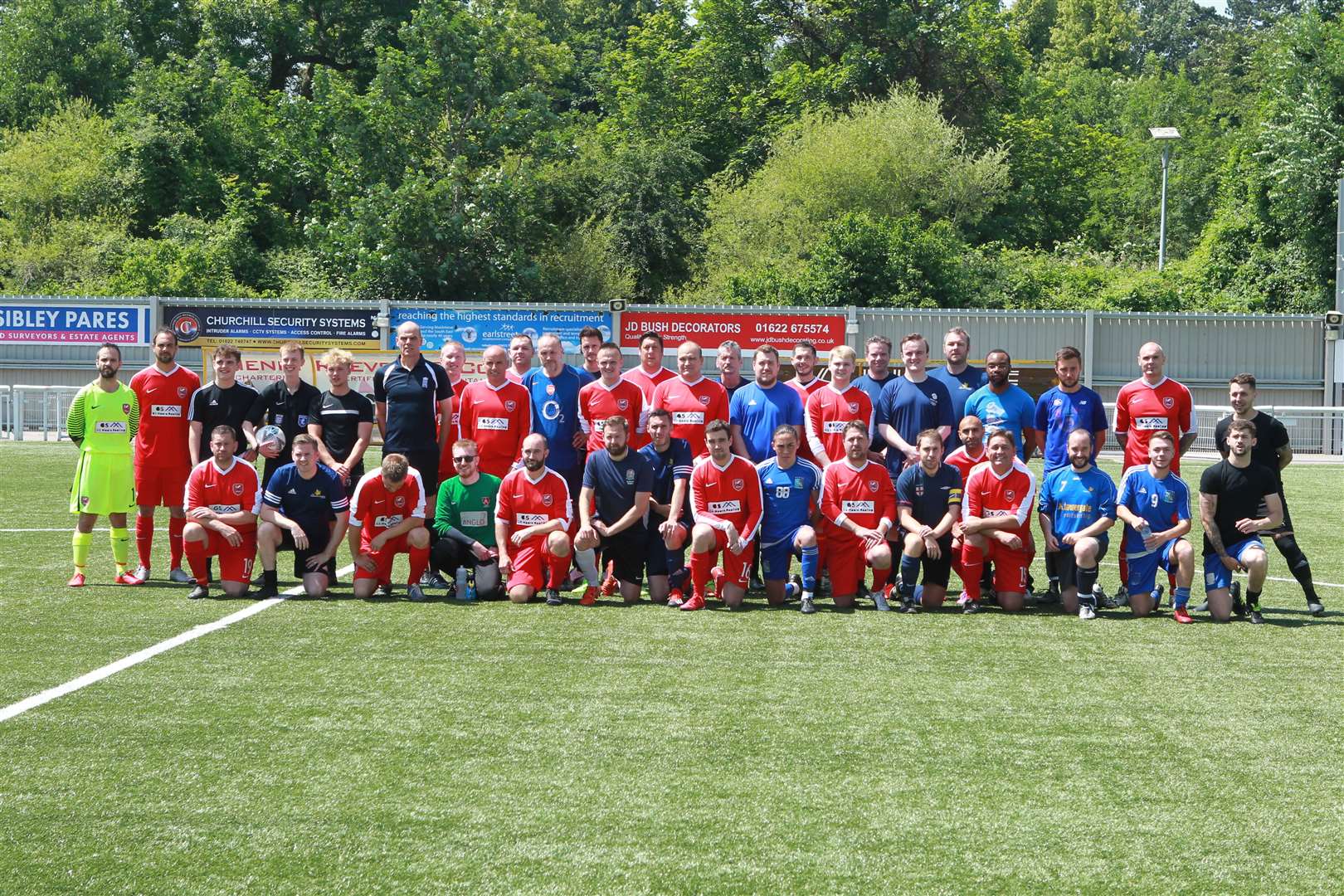 The teams: Maplesden Noakes School Staff in blue and Scout Leaders in red