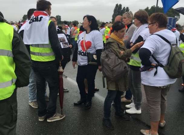 Protesters wear I love Calais T shirts