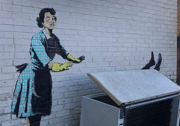 The Banksy mural depicts a battered 1950s housewife pushing a man into a fridge freezer, which Thanet District Council removed