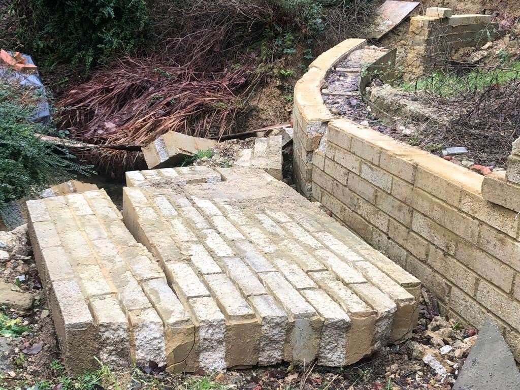 The wall which collapsed in the garden of Sandra and Stephen West's home in Benenden, near Tunbridge Wells. Picture: SWNS