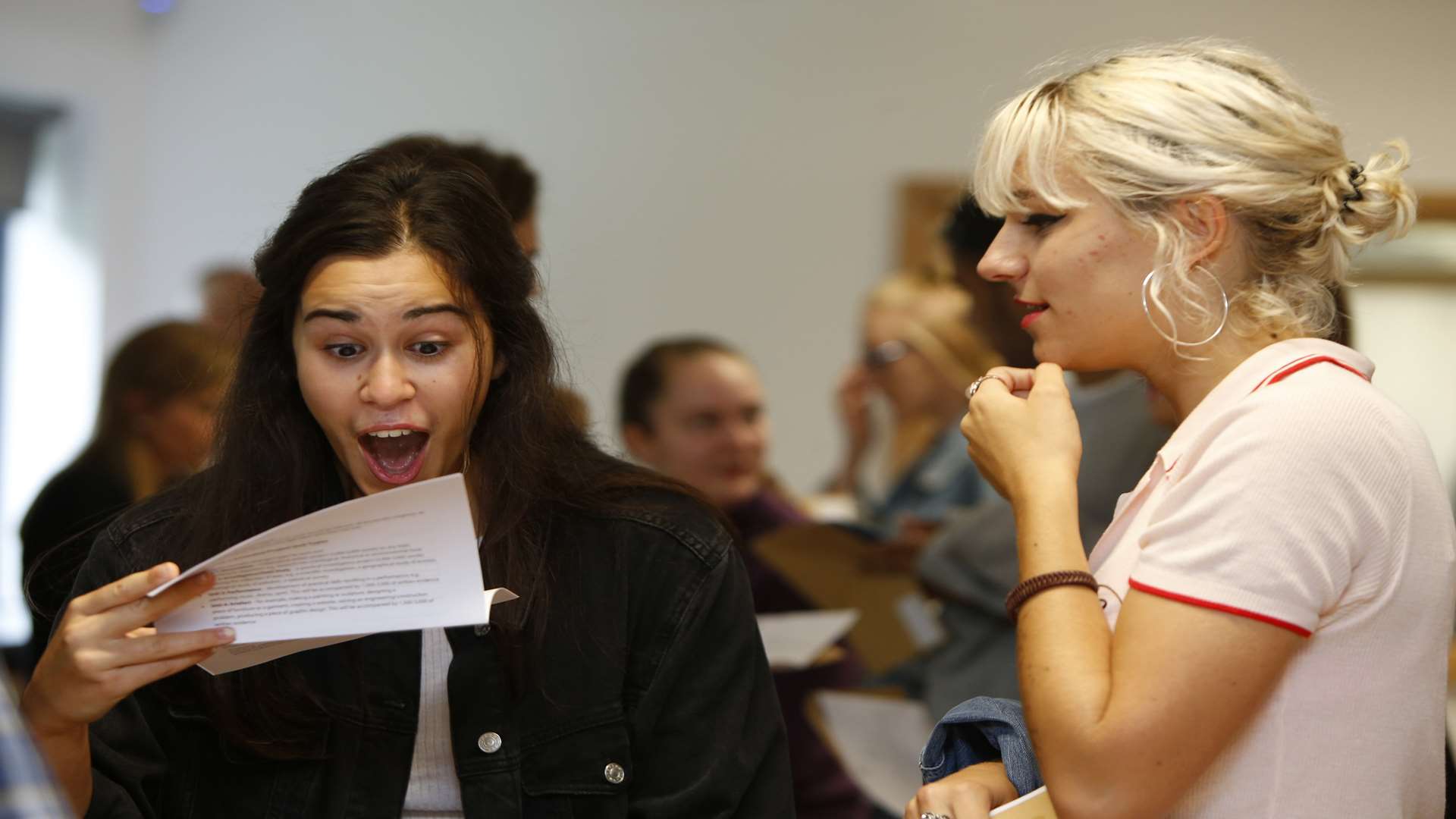 Carys Morgan, left, picks up her A-level results with May Oney at Valley Park secondary school in Maidstone