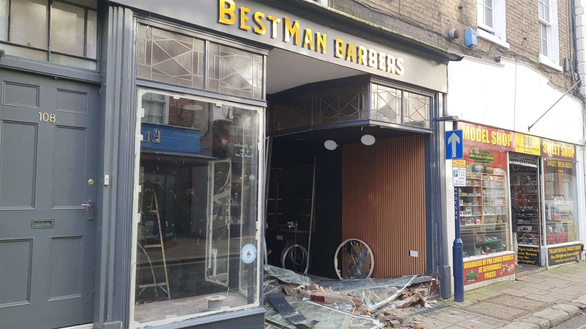Police have launched an investigation into the alleged destruction of a barber shop in Hythe High Street. Picture: Berkan Yakit