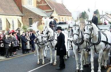 Hundreds of mourners lined the streets for the twins' funeral in February Picture: UKNIP