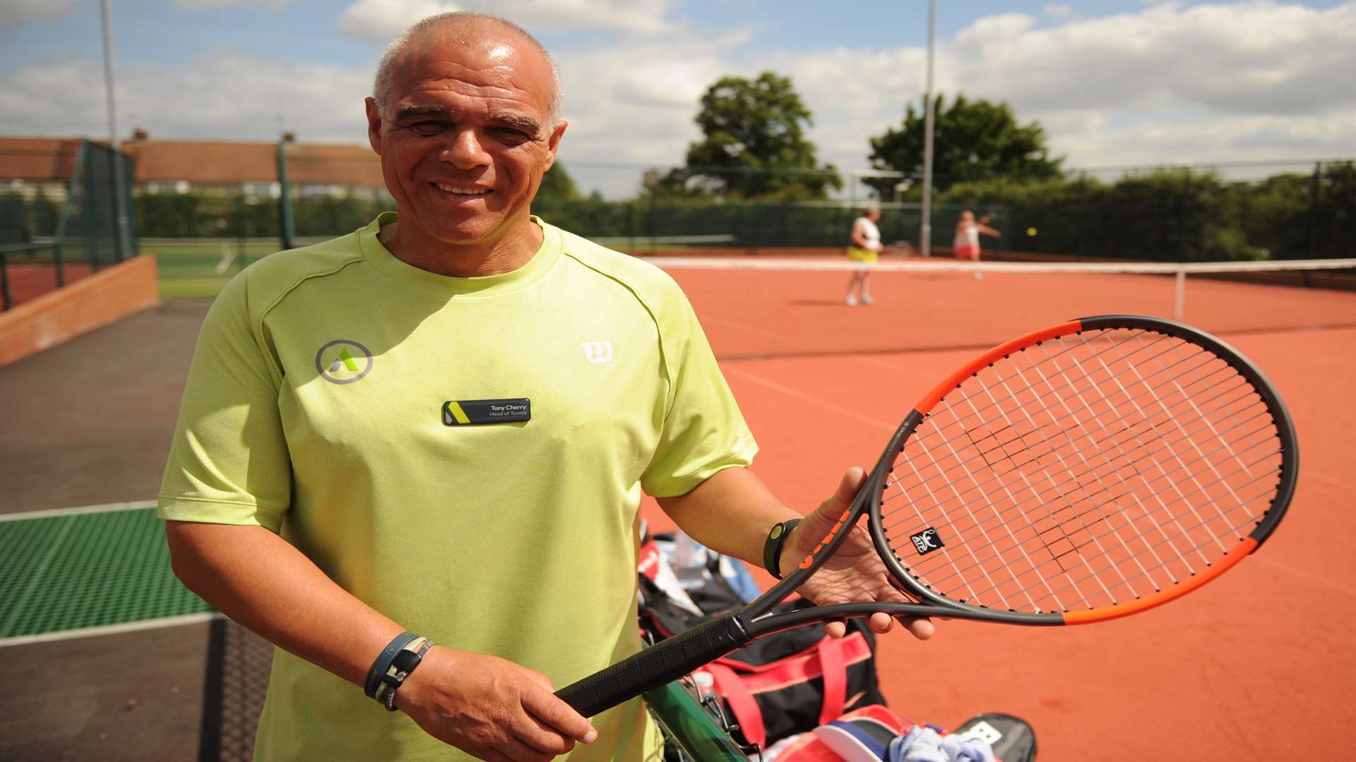 Avenue Tennis coach Tony Cherry on the clay courts Picture: Steve Crispe