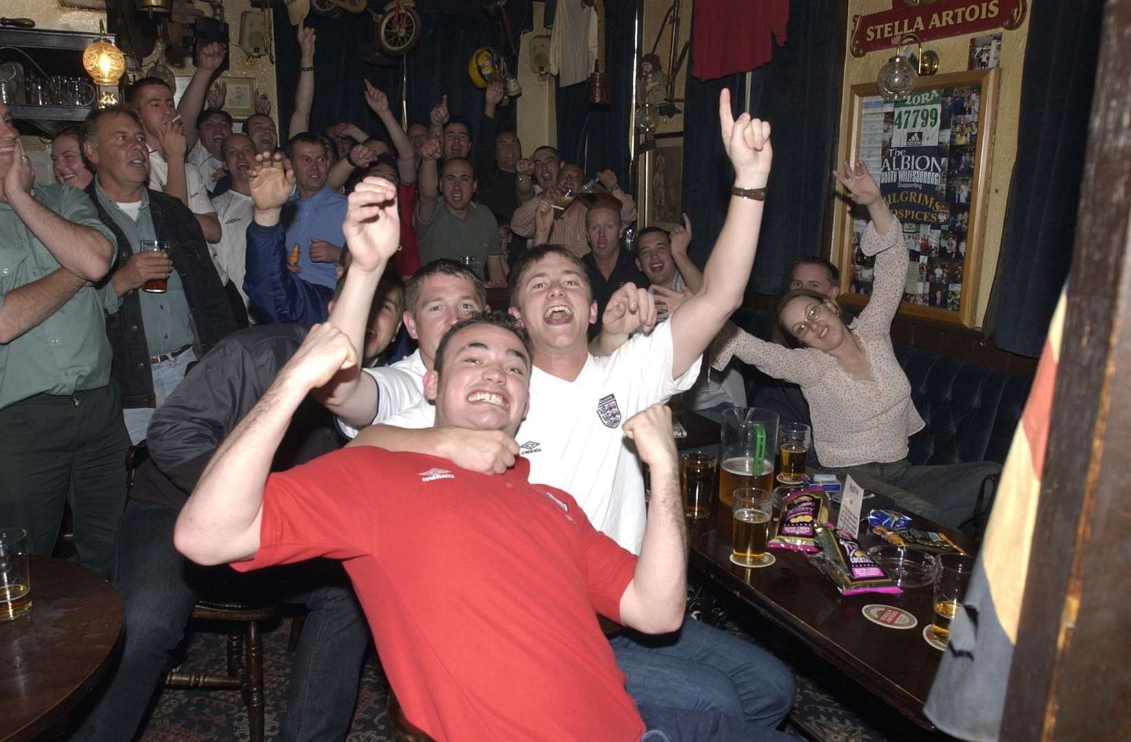 England fans at The Albion, Willesborough, celebrate their team's victory over Argentina in 2002