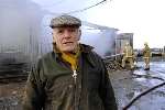 Farmer Richard Ovenden at the scene of the barn fire