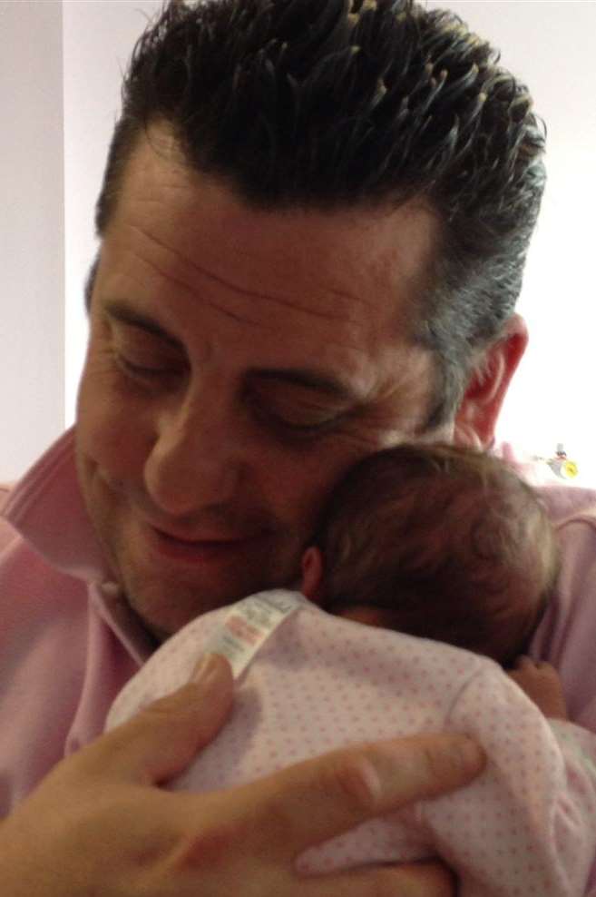 Phil Gaffin with daughter Erin shortly after she was born